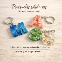 🔑 Porte-clé solidaire personnalisé – Résine artisanale